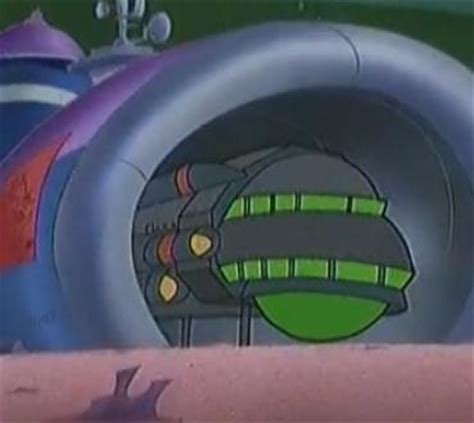 It is a large black ship with green windows, a telescoping ramp in. . Cyberchase hacker ship